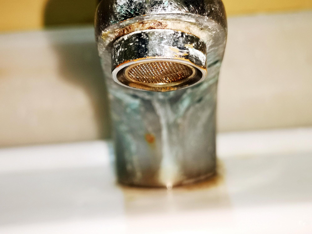 A sink with evidence of hard water